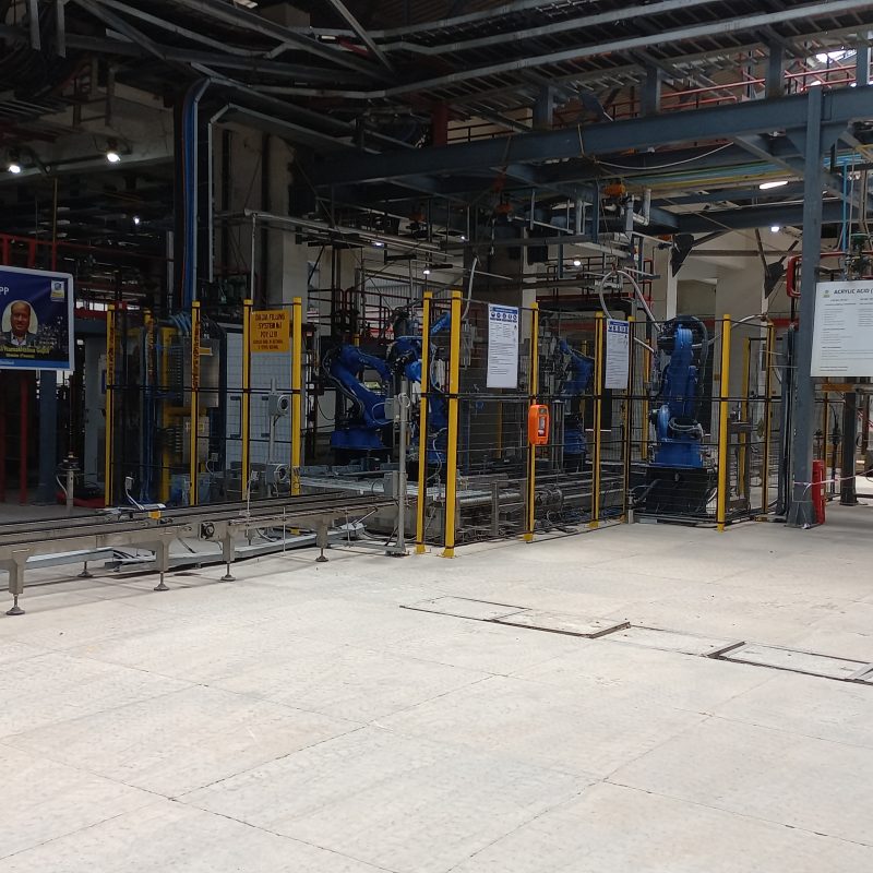 drum filling machine with uncapping, filling and capping stations