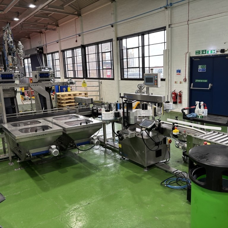 liquid filling systems for canisters and pails
